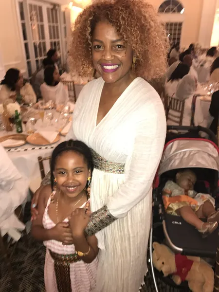 Tami and her daughter in traditional Ethiopian dress
